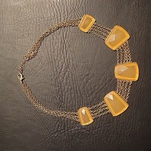 Amber and gold tone collar necklace